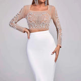Conjunto Feminino Com Cropped com Pérolas Bordadas em Tule Nude + Saia Midi Branca de Cintura Alta – Gerard