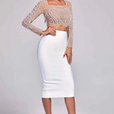 Conjunto_Feminino_Com_Cropped_com_P_rolas_Bordadas_em_Tule_Nude_Saia_Midi_Branca_de_Cintura_Alta_GerardVIEUX_OFICIAL