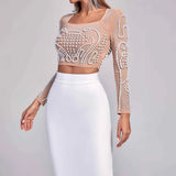 Conjunto_Feminino_Com_Cropped_com_P_rolas_Bordadas_em_Tule_Nude_Saia_Midi_Branca_de_Cintura_Alta_GerardVIEUX_OFICIAL