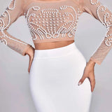 Conjunto_Feminino_Com_Cropped_com_P_rolas_Bordadas_em_Tule_Nude_Saia_Midi_Branca_de_Cintura_Alta_GerardVIEUX_OFICIAL